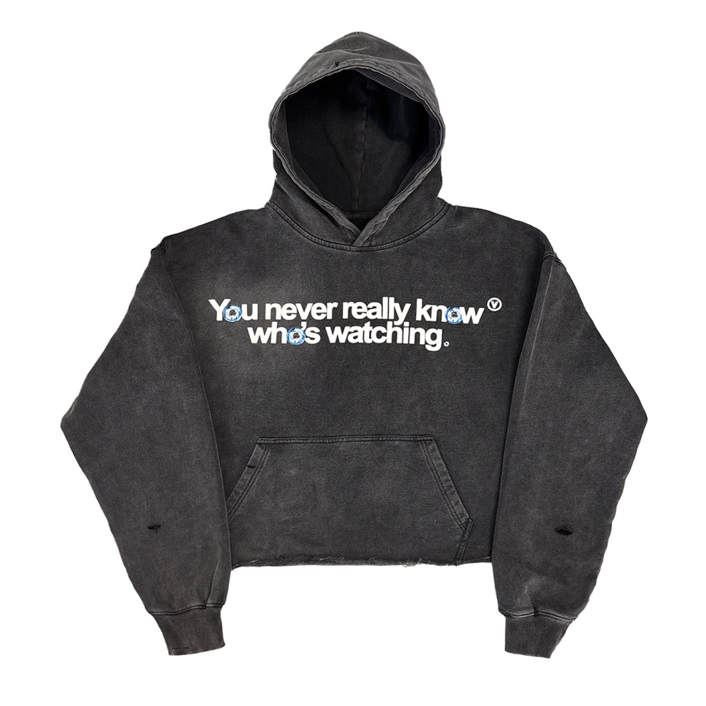 Black hoodie with text 'You never really know who's watching' on a white background