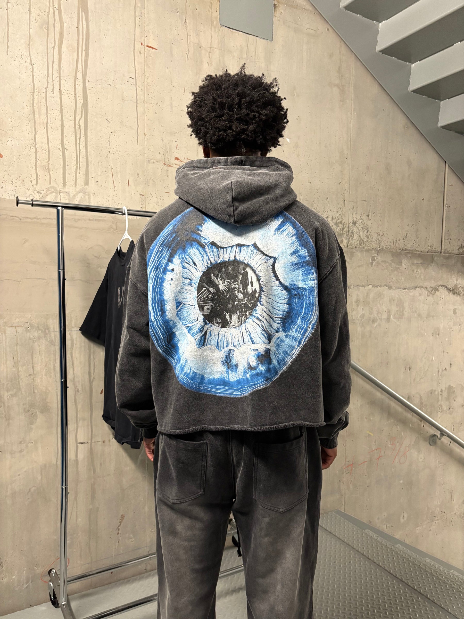 back view of model wearing the eyeball hoodie