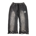 Distressed black pants with a logo on a white background